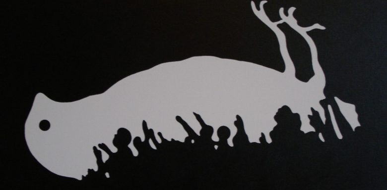 Silhouette of a stylised creature against a dark background.