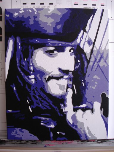 A stylised portrait of a smiling man in a pirate hat making a shushing gesture.