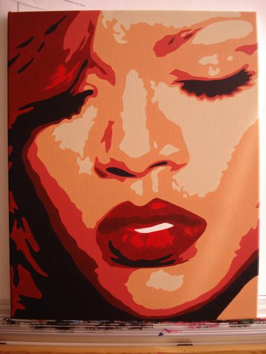 Stylised portrait of a woman with red hair and bold red lips.